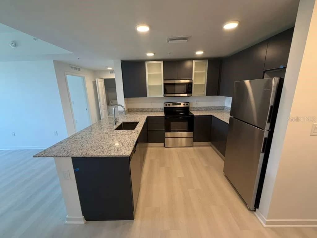 5587 MILLENIA PARK Boulevard #409, Orlando, FL 32839 2
