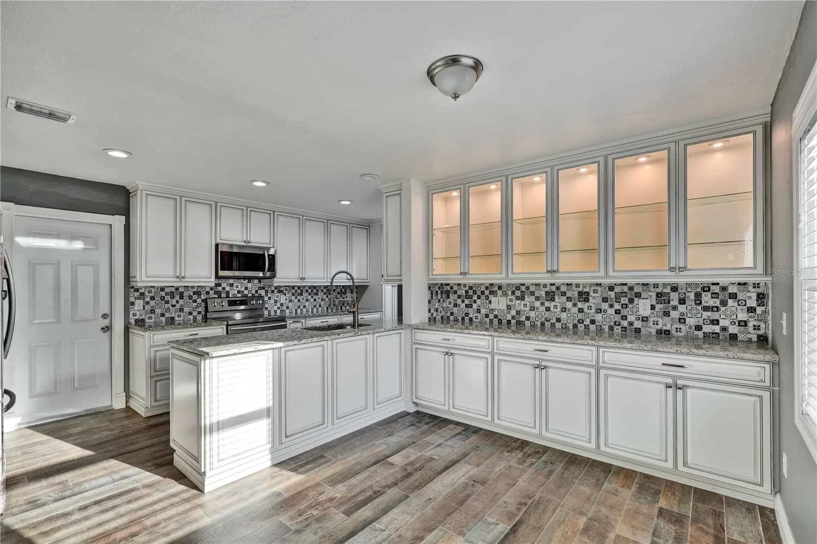1879 KAMLER, Orlando, FL 32817 2