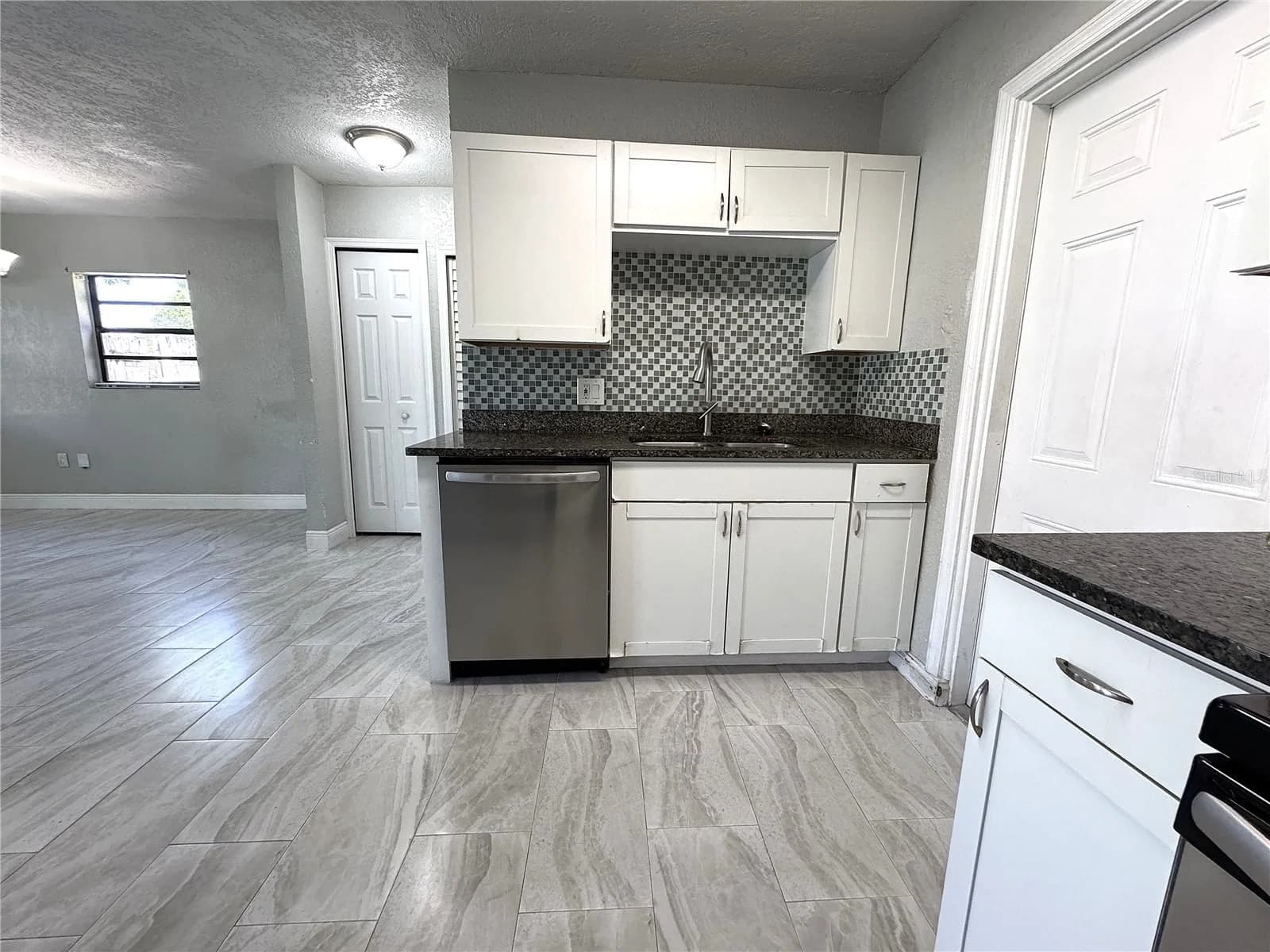 7719 UDINE Avenue, Orlando, FL 32819 2