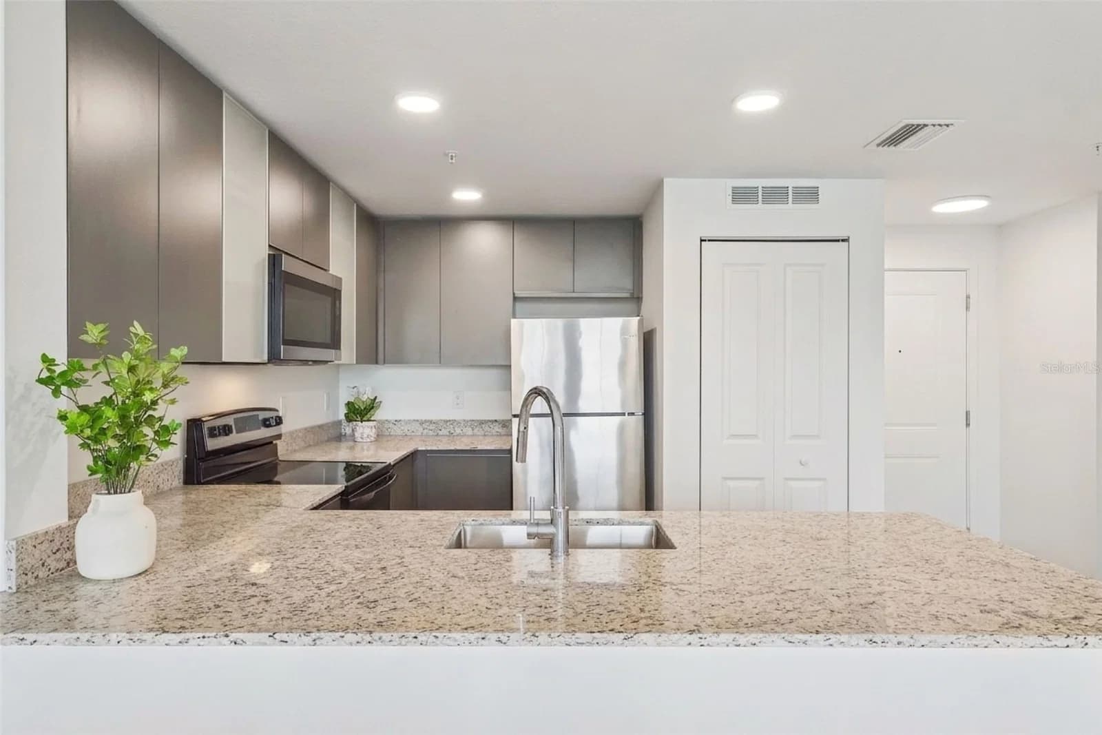 5587 MILLENIA PARK Boulevard #203 5